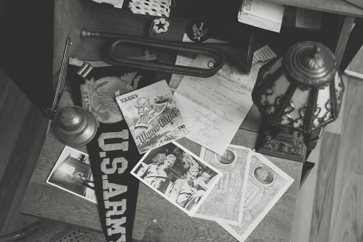 A desk full of wartime letters and memories
